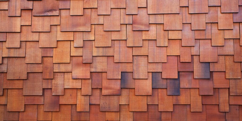 bigstock_33212171_new-section-of-a-red-shake-cedar-or-redwood-roof Residential Flat Roofs